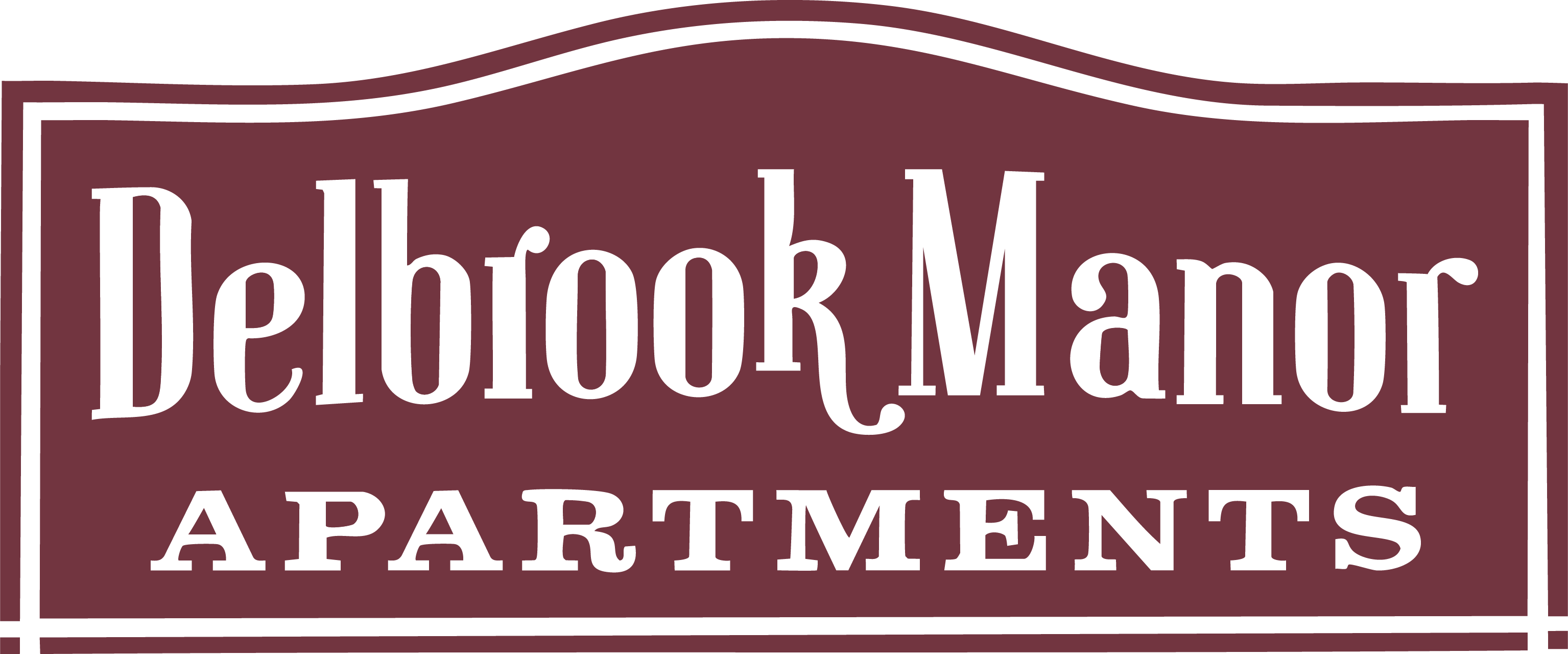 A sign that says Delbrook Manor Apartments.